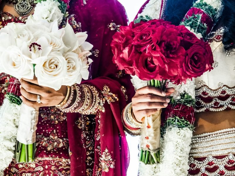 Two Indian Wedding Bouquets and brides